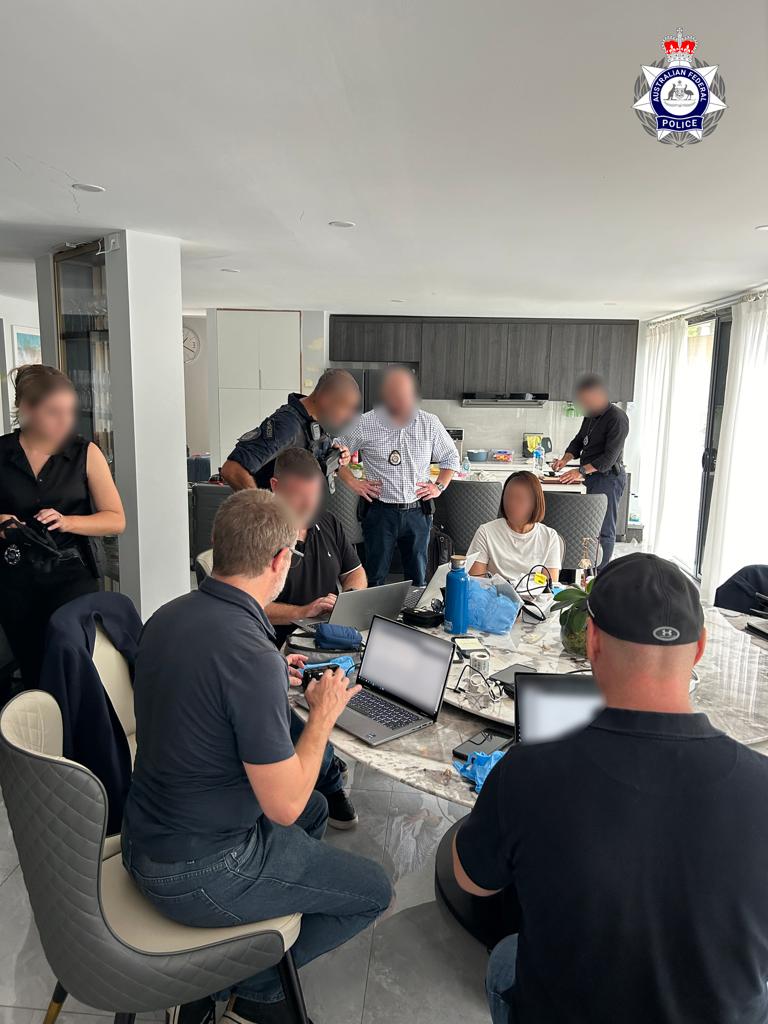 Australian police arresting Mei Lin in her Brisbane home on January 16.
[[Picture credit: Australian Federal Police]]