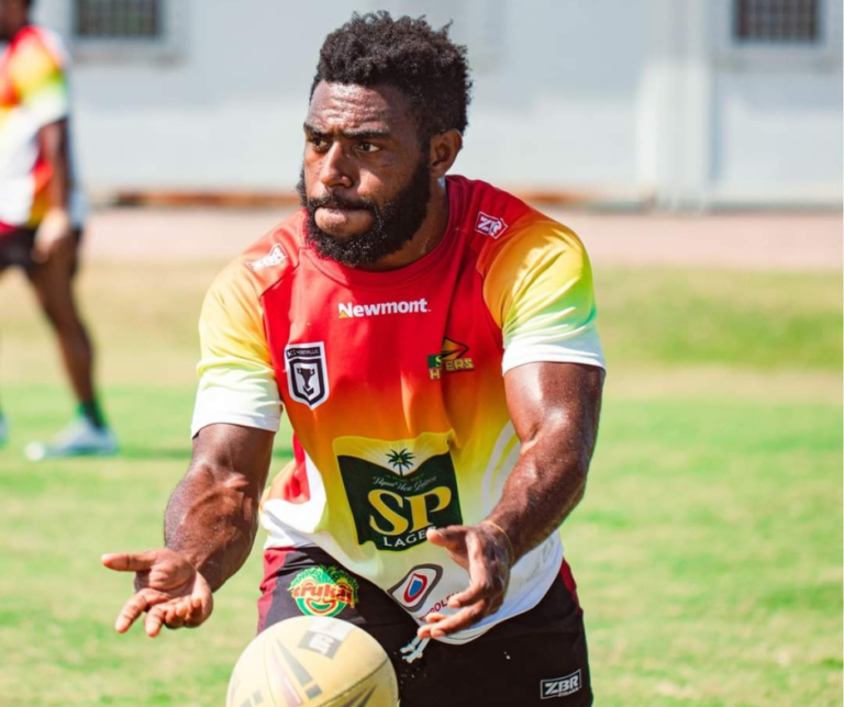 Glare in for Mavoko Rugby player wearing orange and white SP PNG Hunters Jersey