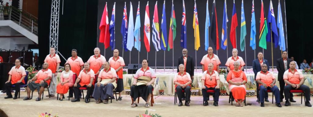 Pacific Island Leaders group photo against a backdrop of Pacific Island Flags