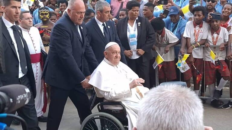 One Language of Love Pope Francis being wheeled in a wheelchair at Caritas Technical Secondary School in Port Moresby