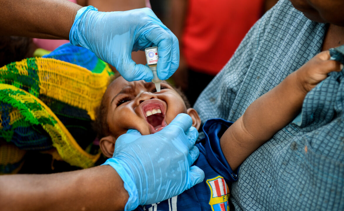 A young child is seen at the Malahang Health Clinic where the Polio vaccine is administered to children in Lae, Marobe Province, Papua New Guinea, Tuesday, July 24, 2018. A confirmed Vaccine Derived Polio Virus (VDPV) in Lae, Morobe Province, Papua New Guinea was reported to WHO on 21 June, 2018. Four rounds of supplementary immunisation activity (SIA) targeting children less that five years of age is planned from July to October 2018, to combat the virus. (AAP Image for Gavi/Brendan Esposito)