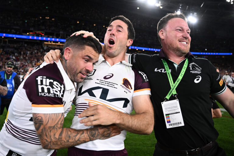 Ben Hunt Finally Lifts the Trophy for Brisbane Broncos Adam Reynolds (left) Ben Hunt of the Broncos celebrate winnin the NRL Grand Final match between the Brisbane Broncos and the Melbourne Storm at Accor Stadium in Sydney.