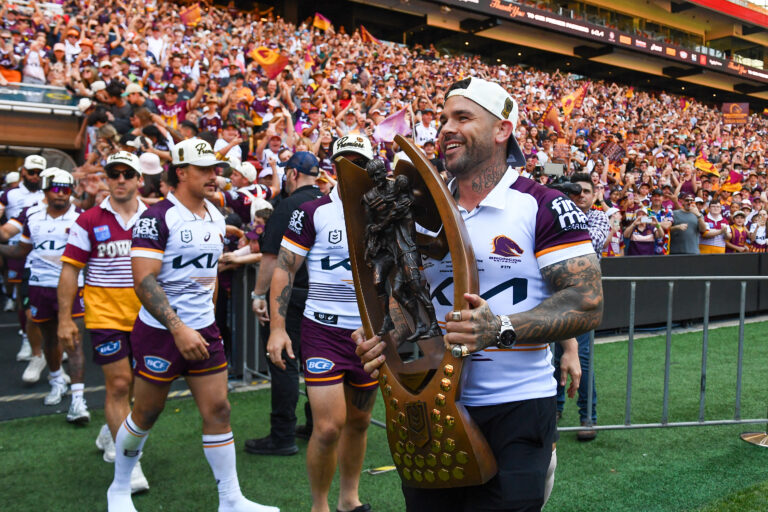 Adam Reynolds of the Broncos leads his team out during the teams return to Suncorp stadium in Brisbane