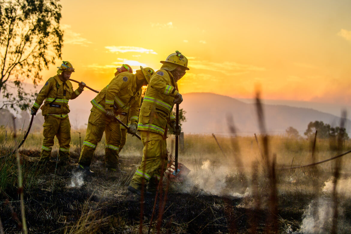 Firefighters putting out bushfires