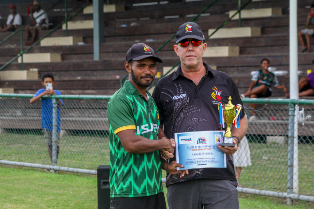 PNG Cricket player, Lega Siaka receiving award.