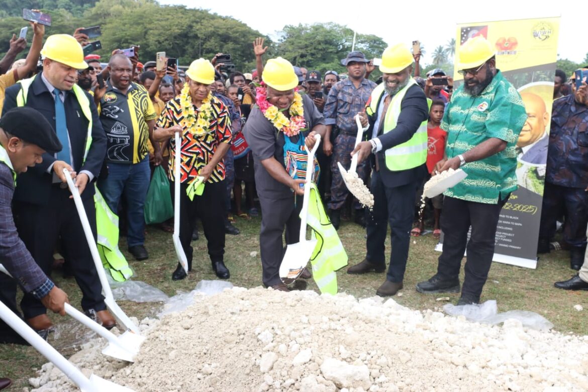 Men holding shovels for a ground breaking ceremony