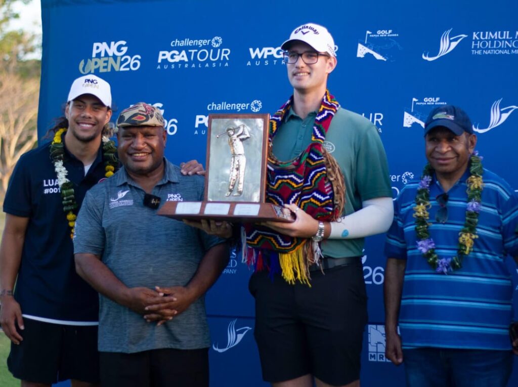 Supplied Image: Josh Armstrong, the winner of the Challenger for GPA Tour of Australasia standind with Prime Minister James Marape, NRL star Jemore Luai and Tourism Minister, Belden Namah.  